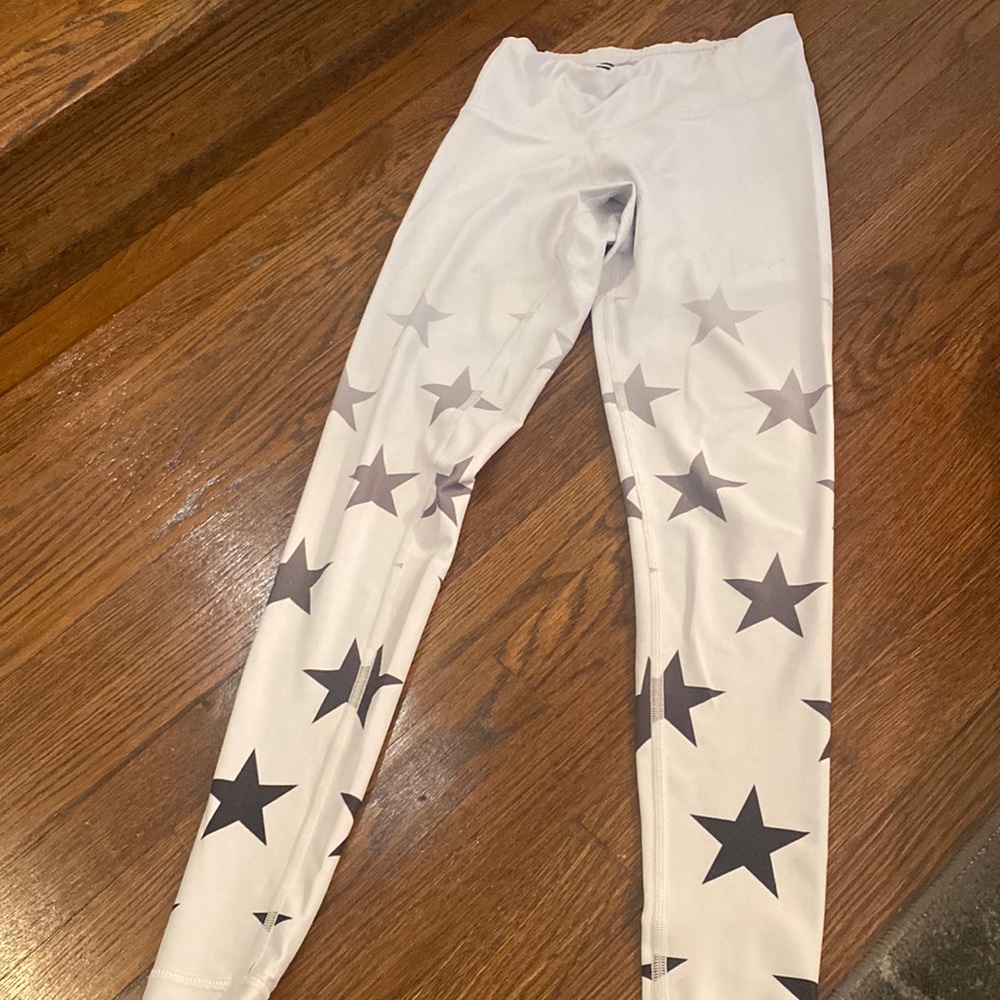 White chrldr work out leggings with stars from Barry’s boot camp